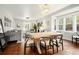 Dining area with stylish table, bay window, and elegant chandelier at 3315 N Stuart St, Denver, CO 80212