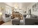 Open concept living and dining space with modern furnishings and ample natural light at 3315 N Stuart St, Denver, CO 80212