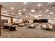 Grand ballroom with tables and buffet in the Heritage Eagle Bend community at 7633 S Addison Way, Aurora, CO 80016