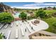 Outdoor event space in Heritage Eagle Bend community with ceremony stage and seating facing the pool at 7633 S Addison Way, Aurora, CO 80016