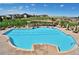 Large swimming pool with lounge chairs at the Heritage Eagle Bend community at 7633 S Addison Way, Aurora, CO 80016