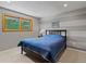 Comfortable bedroom with a large window offering plenty of natural light at 4175 S Sidney Ct, Denver, CO 80237