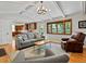 Open-concept living space seamlessly connects to the modern kitchen at 4175 S Sidney Ct, Denver, CO 80237