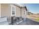 Backyard grill area with a grill, smoker, and cooler for outdoor cooking at 10553 Xenia Ct, Commerce City, CO 80640