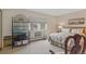 Bright bedroom with ample storage space, natural light, and a comfortable bed at 13631 E Marina Dr # 502, Aurora, CO 80014