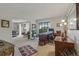 Home office featuring a wooden desk and a view to the living room at 13631 E Marina Dr # 502, Aurora, CO 80014