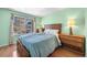 Cozy bedroom featuring a window and lamps at 8915 Field St # 116, Broomfield, CO 80021