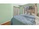 Bedroom featuring a window and curtains at 8915 Field St # 116, Broomfield, CO 80021