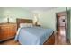 Cozy bedroom featuring lamps and doorway at 8915 Field St # 116, Broomfield, CO 80021