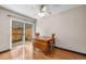 Dining area features hardwood floors and sliding door leading to a fenced outdoor area at 8915 Field St # 116, Broomfield, CO 80021