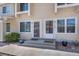 Welcoming townhouse entrances with well-lit front doors and attractive landscaping details at 8915 Field St # 116, Broomfield, CO 80021