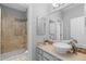 A stylish bathroom featuring a large vessel sink and modern vanity at 10700 Addison Ct, Highlands Ranch, CO 80126