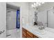 A functional bathroom with modern fixtures and ample counter space at 10700 Addison Ct, Highlands Ranch, CO 80126