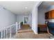 Upstairs hallway with office nook, neutral paint and carpets that leads to bedrooms at 10700 Addison Ct, Highlands Ranch, CO 80126