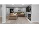 Cozy living room featuring a fireplace, TV, and comfortable seating arrangement at 10700 Addison Ct, Highlands Ranch, CO 80126