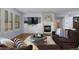 Inviting living room featuring a fireplace, soft textures, and stylish decor at 10700 Addison Ct, Highlands Ranch, CO 80126