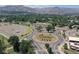 Expansive aerial view of property featuring mature landscaping, nearby parking, and picturesque mountain views at 615 24Th St # 103, Golden, CO 80401