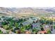 Scenic aerial view of the neighborhood with lush greenery, mountain views and convenient parking at 615 24Th St # 103, Golden, CO 80401