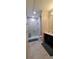 Contemporary bathroom featuring a walk-in shower with glass door and a modern vanity at 615 24Th St # 103, Golden, CO 80401