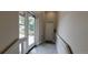 Bright entryway with neutral walls leads to a secure door, featuring modern design elements and durable flooring at 615 24Th St # 103, Golden, CO 80401