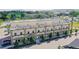 Eye-level exterior shot of the commercial building with professional landscaping and ample parking at 615 24Th St # 103, Golden, CO 80401