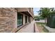 Charming exterior featuring stone accents, covered entryway, and ample parking at 615 24Th St # 103, Golden, CO 80401