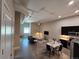Open-concept living room featuring modern decor, high ceilings, sleek flooring, and a stylish kitchen area at 615 24Th St # 103, Golden, CO 80401