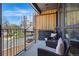 Inviting balcony with outdoor seating, perfect for relaxing and enjoying views of the street at 1601 Park Ave # 202, Denver, CO 80218