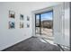 Bright bedroom with a large window view of the city at 1601 Park Ave # 202, Denver, CO 80218
