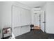 Modern bedroom with Murphy bed and white color scheme at 1601 Park Ave # 202, Denver, CO 80218