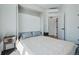 Bedroom featuring Murphy bed and white color scheme at 1601 Park Ave # 202, Denver, CO 80218