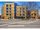 Apartment building featuring modern architecture and attractive landscaping, perfect for upscale urban living at 1601 Park Ave # 202, Denver, CO 80218