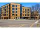 Apartment building featuring modern architecture and attractive landscaping, perfect for upscale urban living at 1601 Park Ave # 202, Denver, CO 80218