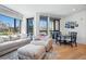 Open-concept living and dining area with lots of natural light, creating a warm, spacious atmosphere at 1601 Park Ave # 202, Denver, CO 80218