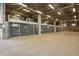 Parking garage featuring car stacker system for compact and convenient parking at 1601 Park Ave # 202, Denver, CO 80218