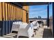 Outdoor rooftop patio with comfortable seating and city views at 1601 Park Ave # 202, Denver, CO 80218