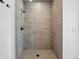 Modern tiled shower with sleek fixtures at 1601 Park Ave # 202, Denver, CO 80218