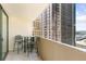 Balcony seating offering amazing city views, with table and chairs perfect for outdoor lounging at 1020 15Th St # 16A, Denver, CO 80202