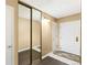 Inviting entryway with tile flooring and a mirrored closet, offering style and functionality at 1020 15Th St # 16A, Denver, CO 80202