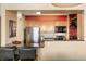 Modern kitchen with stainless steel appliances, granite countertops, breakfast bar, and open concept design at 1020 15Th St # 16A, Denver, CO 80202