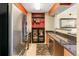 Updated kitchen with stainless steel appliances, granite countertops, and a decorative rug, adjacent to living spaces at 1020 15Th St # 16A, Denver, CO 80202