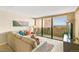 Cozy living room featuring a balcony with beautiful city views at 1020 15Th St # 16A, Denver, CO 80202