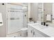 Modern bathroom with white vanity, quartz countertop, and a glass shower at 18950 E Geddes Ave, Centennial, CO 80016