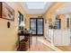 Bright kitchen with skylight, black trimmed windows and doors, island and breakfast nook at 357 Birch St, Denver, CO 80220