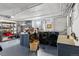 Spacious laundry room featuring modern washer and dryer units and ample counter space at 357 Birch St, Denver, CO 80220