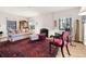 Inviting living room featuring a fireplace, hardwood floors, and abundant natural light at 357 Birch St, Denver, CO 80220