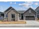 Charming single-Gathering home with a modern design, a gray garage door, and well-maintained landscaping at 8658 Pennycress Dr, Littleton, CO 80125