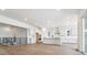 Spacious kitchen with an island, stainless steel appliances, and ample cabinet space at 8658 Pennycress Dr, Littleton, CO 80125