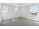 Bedroom featuring plush carpeting and natural light at 9151 Telluride Ct, Commerce City, CO 80022