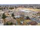 A home located across from a school in a neighborhood with mature trees and well kept landscaping at 3261 Kassler Pl, Westminster, CO 80031